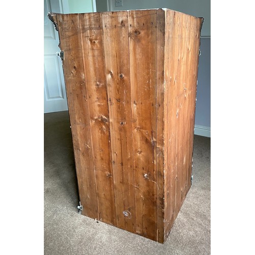 1255 - A 19thC single door oak corner cupboard with H hinges and 2 shelves to the interior. 80 w x 108 h x ... 