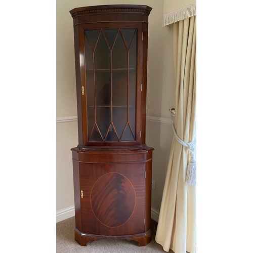 1260 - A reproduction mahogany tall corner display cabinet glazed to top.
65 w x 182 h x 48cm d.