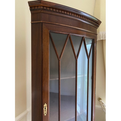 1260 - A reproduction mahogany tall corner display cabinet glazed to top.
65 w x 182 h x 48cm d.