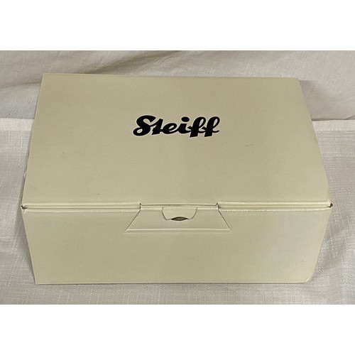 757 - A Steiff owl in box. 15cm h.