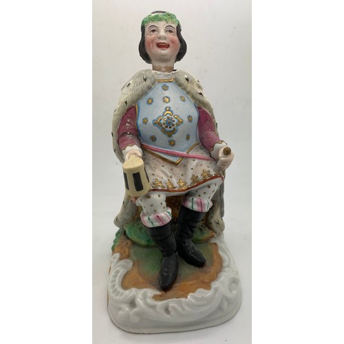 208 - A 19thC ceramic nodder figure depicting Old King Cole. 16cm h.