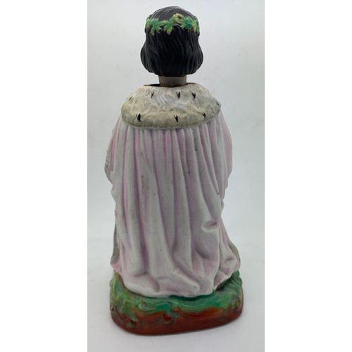 208 - A 19thC ceramic nodder figure depicting Old King Cole. 16cm h.