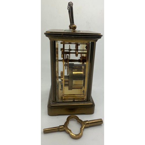 622 - A brass carriage clock by Matthew Norman. 14cm h. In working order.