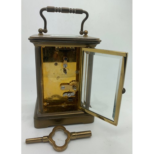 622 - A brass carriage clock by Matthew Norman. 14cm h. In working order.