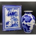 A 19thC Chinese blue and white vase together with a Chinese blue and white ceramic plaque. Vase 30.5... 