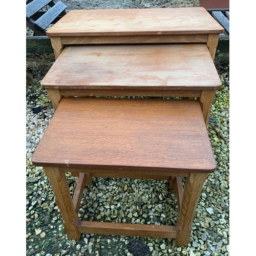 1264 - A Robert Mouseman Thompson nest of three tables. Rectangular shape, largest table 60.5 w x 37 d x 47... 