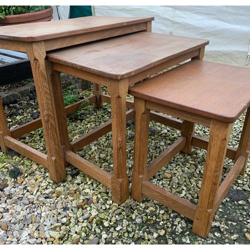 1264 - A Robert Mouseman Thompson nest of three tables. Rectangular shape, largest table 60.5 w x 37 d x 47... 