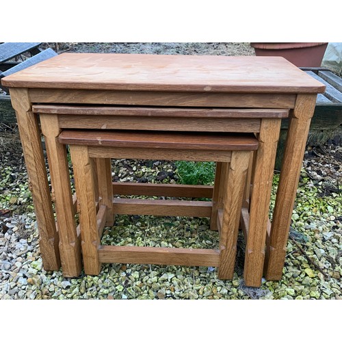 1264 - A Robert Mouseman Thompson nest of three tables. Rectangular shape, largest table 60.5 w x 37 d x 47... 