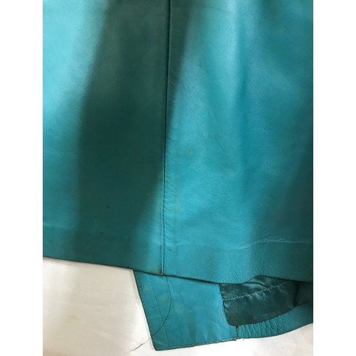 467 - A 1970’s turquoise leather ladies jacket made from Nappa leather, maker unknown. Size 64cm from armp... 