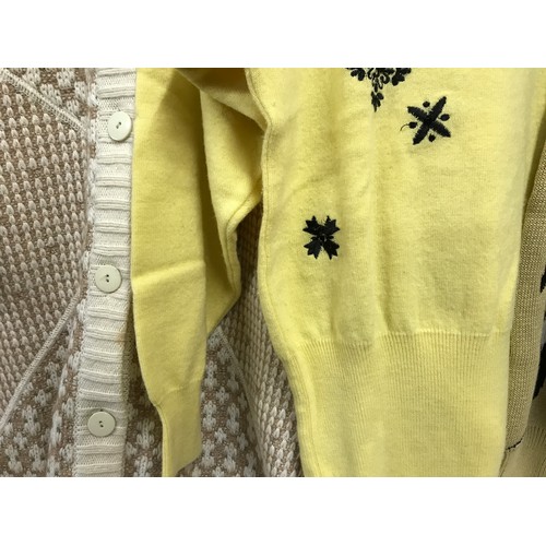 480 - Five Escada 1980's knitted jumpers and cardigans in cream/ yellow/beige tones, some with embroidery ... 