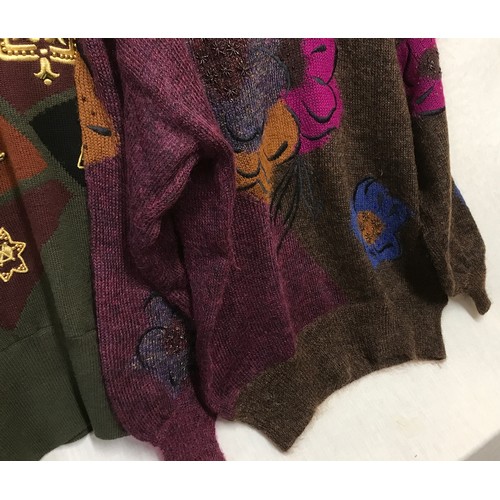 482 - Four Escada 1980's knitted jumpers in green and brown tones and colour inserts. sizes from left to r... 