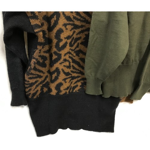 482 - Four Escada 1980's knitted jumpers in green and brown tones and colour inserts. sizes from left to r... 