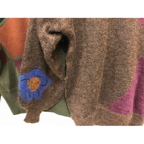 482 - Four Escada 1980's knitted jumpers in green and brown tones and colour inserts. sizes from left to r... 