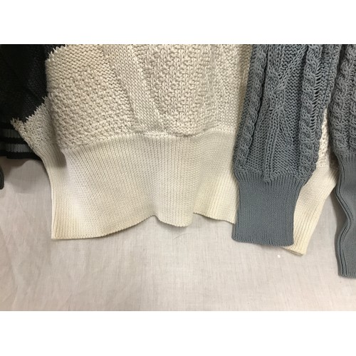 483 - Five Escada 1980's knitted jumpers and cardigans in grey tones with detailing. Sizes from left to ri... 