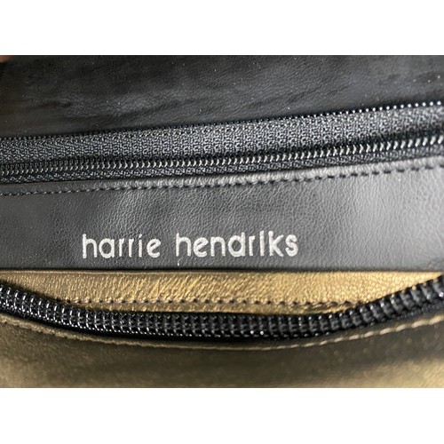 487 - Five soft leather handbag and purses in cream tones to include a harrie hendricks one strap rucksack... 