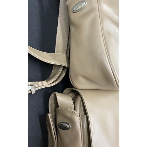 487 - Five soft leather handbag and purses in cream tones to include a harrie hendricks one strap rucksack... 