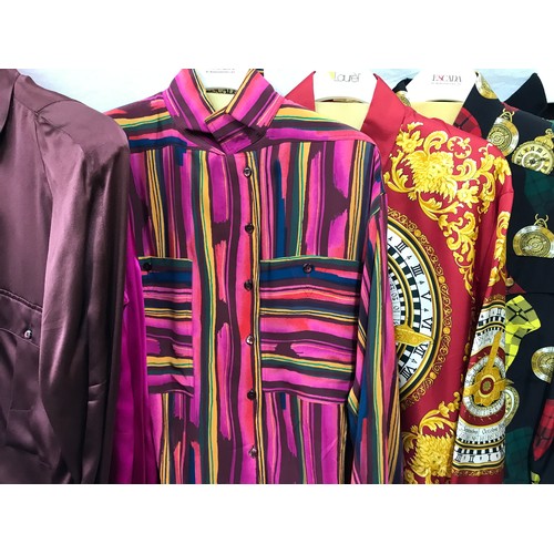 492 - Nine 1980's Escada silk shirts in red hues and various designs, clocks, floral etc. Sizes from left ... 