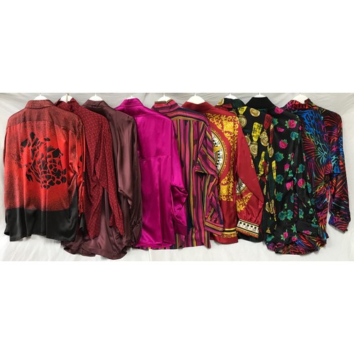 492 - Nine 1980's Escada silk shirts in red hues and various designs, clocks, floral etc. Sizes from left ... 