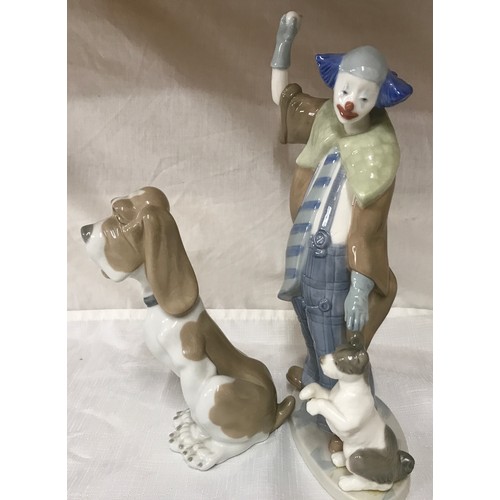 80 - A Nao Lladro tall figurine of a clown with dog 29.5cm h together with a Bassett hound 19cm h.