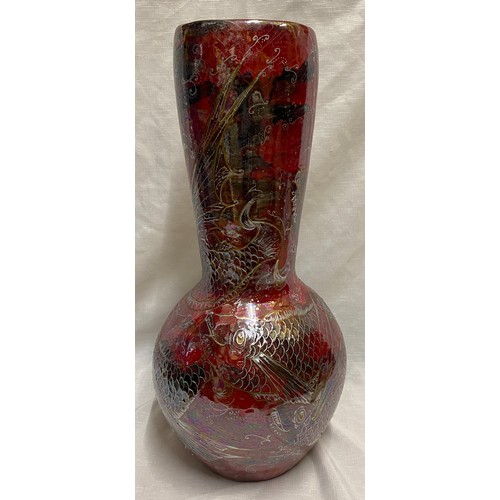 65 - A large floor standing vase “Scarlet Flying Fish”, red lustre depicting fish with gold and silver de... 