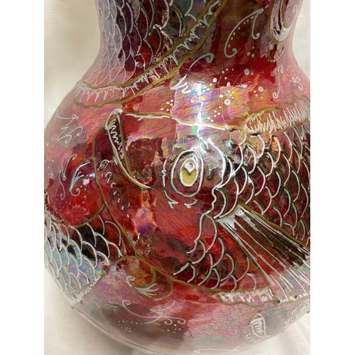 65 - A large floor standing vase “Scarlet Flying Fish”, red lustre depicting fish with gold and silver de... 