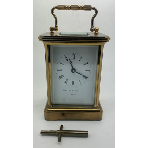 629 - A 20thC Matthew Norman brass cased carriage clock. 15cm h.