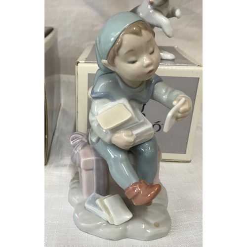 88 - Four Lladro figurines, 2 boxed comprising: Girl washing dog 12cm h, Cat with mouse 8cm h, Santa’s ma... 