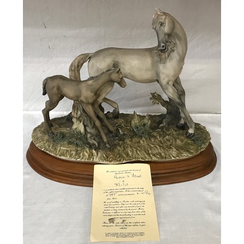 90 - Capodimonte ‘ Horse and Foal’ by Milio with certificate. Height approx. 31cm x base 41cm x 23cm w.