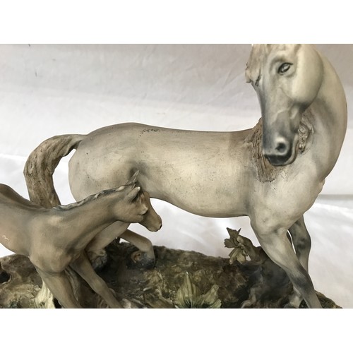 90 - Capodimonte ‘ Horse and Foal’ by Milio with certificate. Height approx. 31cm x base 41cm x 23cm w.