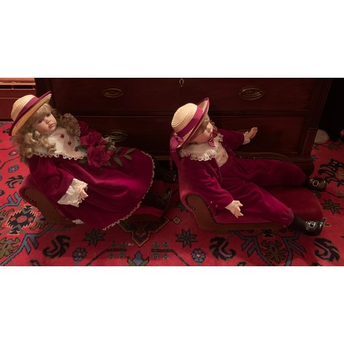 761 - Two Alberon dolls on chaise longues.