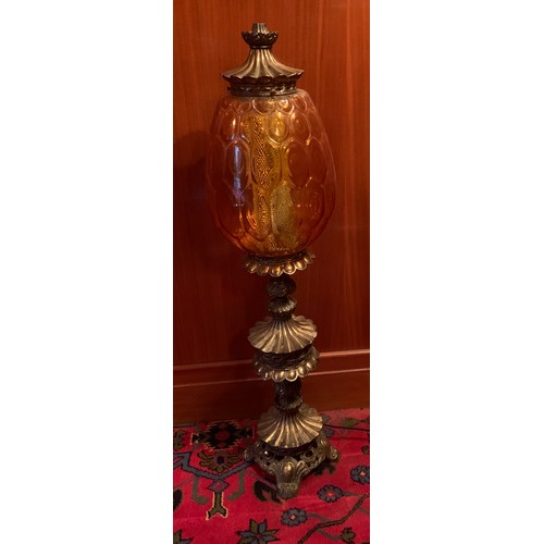 522 - A large gilt, metal and coloured glass table lamp. 97cm h.