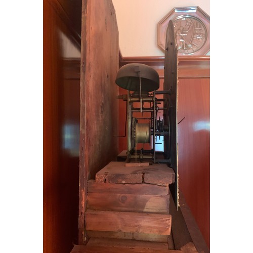 632 - A brass faced 8 day clock by W M Ward Spilsby in an oak case. 225cm h.