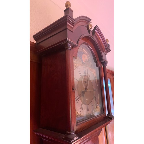 633 - An oak 8 day longcase clock with rolling moon, William Thompson, Chester. 220cm high.