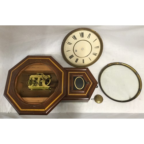 639 - A mahogany wall clock for restoration with painted gold trim, mechanism, pendant, clock face and han... 