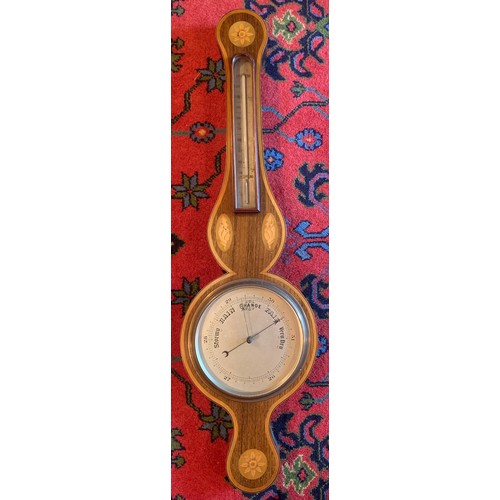 646 - A good quality rosewood and shell inlaid aneroid barometer. 91cm h.