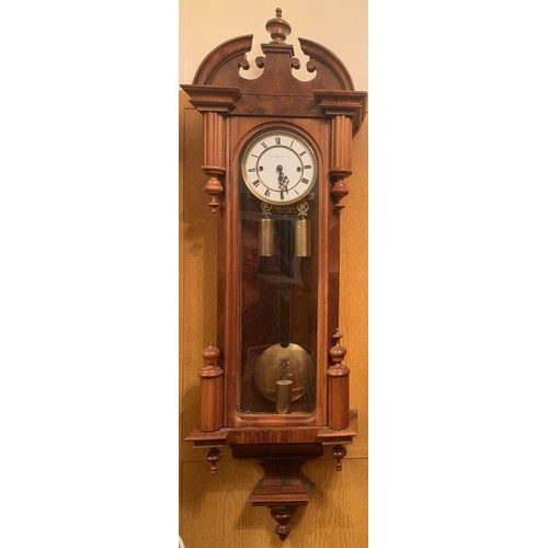 661 - A fine quality walnut triple weight Vienna clock. 136cm h.