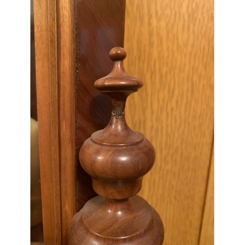 661 - A fine quality walnut triple weight Vienna clock. 136cm h.