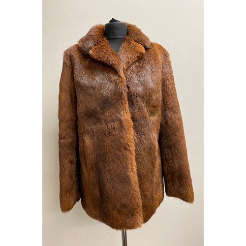 472 - A coney fur jacket size 14, approx. 72cm length from shoulder to hem.