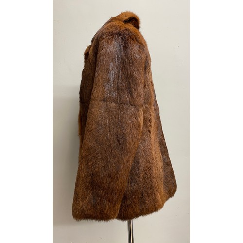 472 - A coney fur jacket size 14, approx. 72cm length from shoulder to hem.