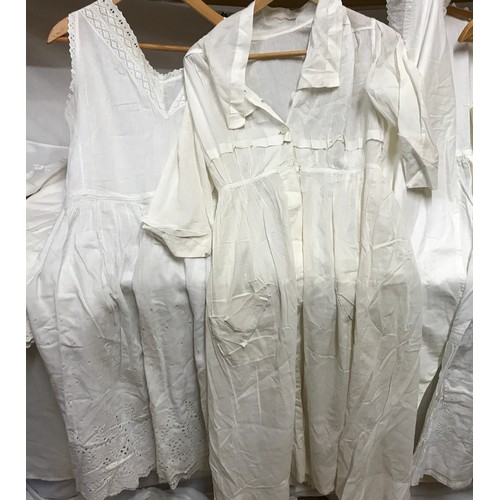 474 - Selection of white linen nightdresses and bloomers with a night cap and underskirt.