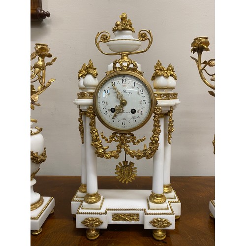 627 - A good quality French marble and ormolu clock garniture, the dial signed Le Roy, the case with four ... 