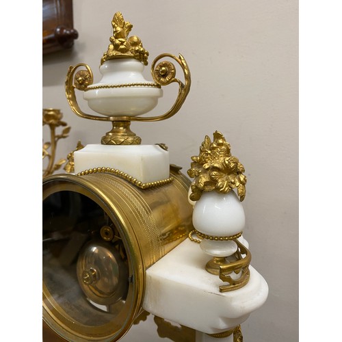 627 - A good quality French marble and ormolu clock garniture, the dial signed Le Roy, the case with four ... 