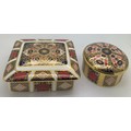 Two Royal Crown Derby lidded jars No. 1128 , one oblong, 10 x 12cm, one round Old Imari pattern.