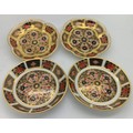Four Royal Crown Derby dishes, Old Imari pattern No. 1128. 11cm d approximately.