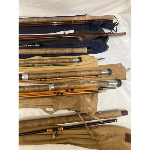 778 - A collection of rods to include 12'6