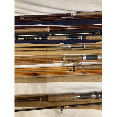 778 - A collection of rods to include 12'6