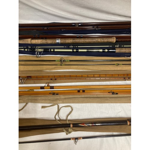 778 - A collection of rods to include 12'6