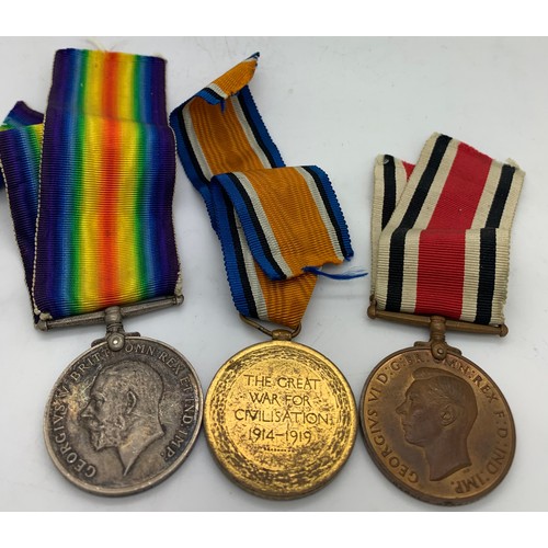 698 - Two WWI Service medals for 32306 Pte. A. Merritt S. Staff. R. and a special constabulary medal Harol... 