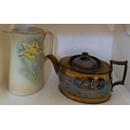 Copper lustre teapot and jug with daffodils.