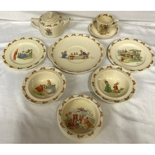 137 - A selection of Bunnykins by Barbara Vernon, Royal Doulton to include cake plate, 2 x side plates, 2 ... 